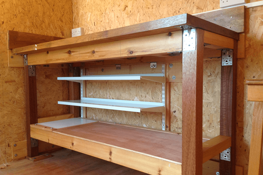 Futher shelving under the work bench
