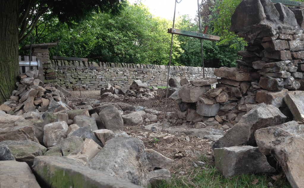Stripped dry stone wall section