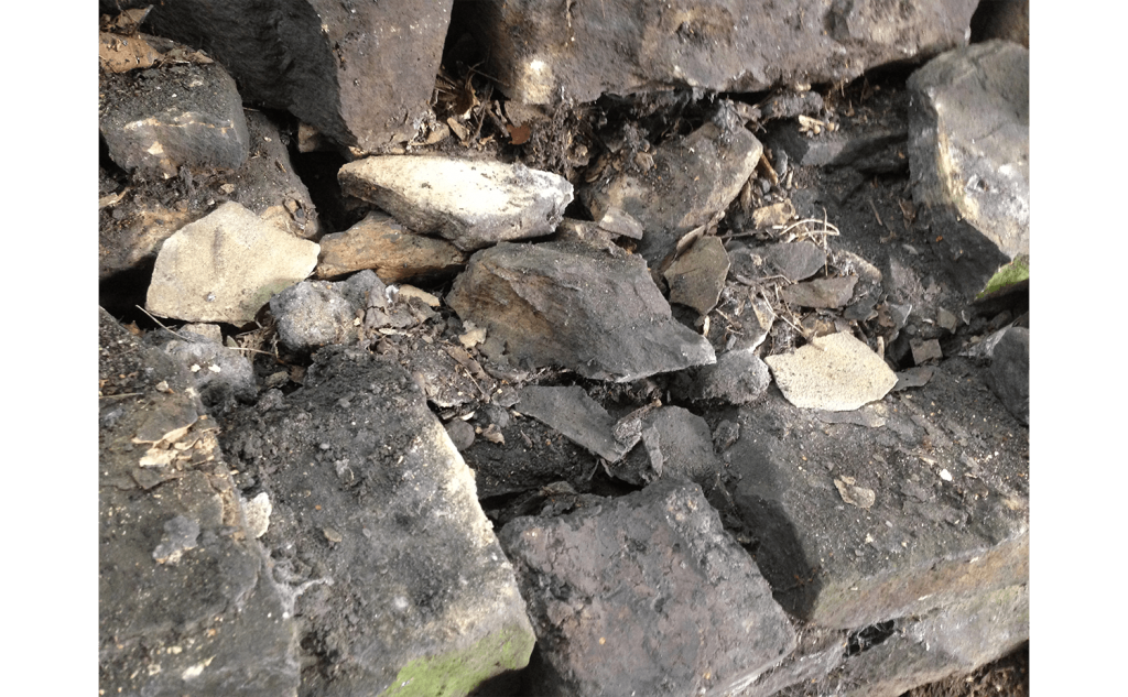 Half brick found as face stone