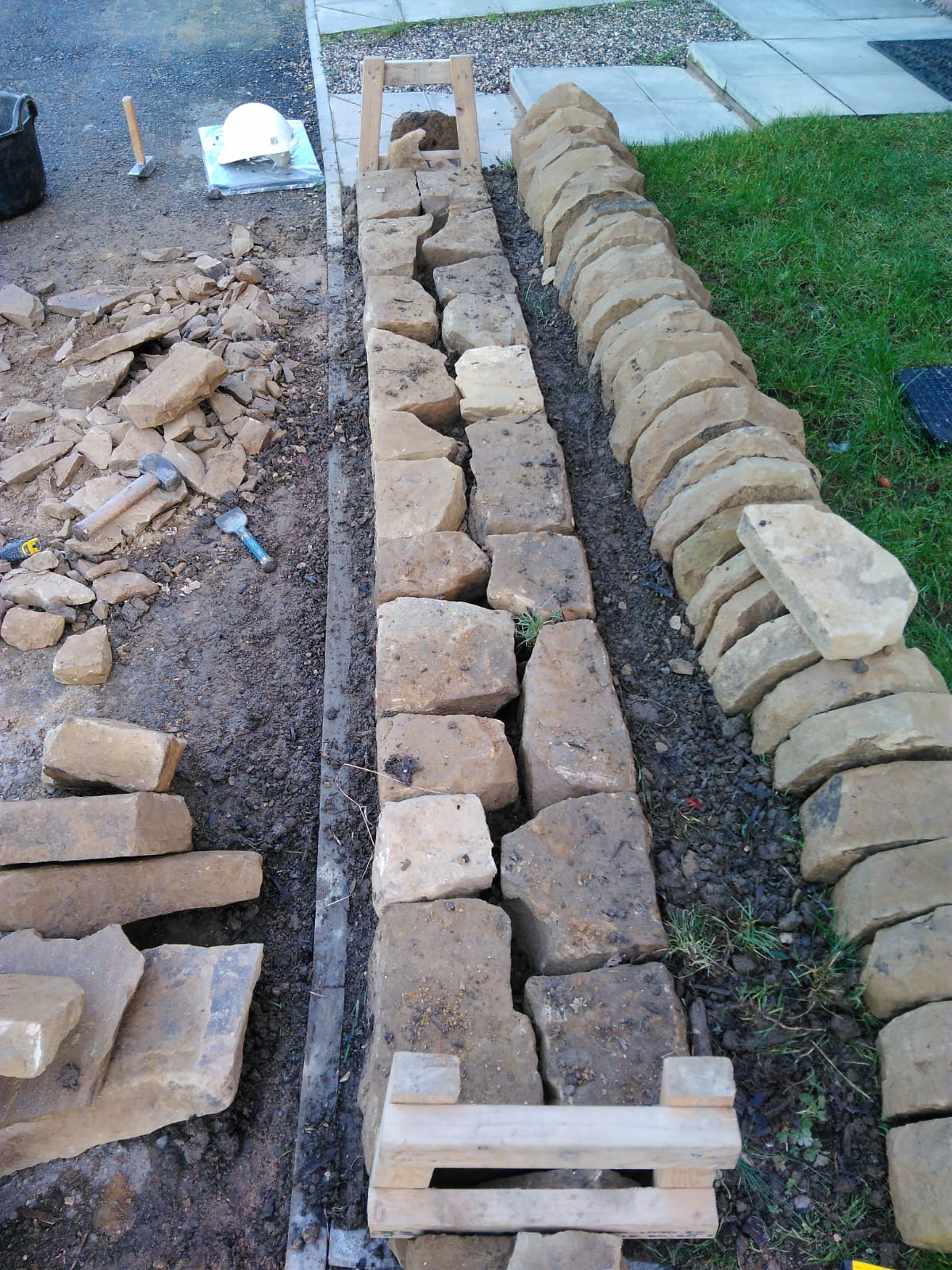 Mill Farm dry stone walling with newly quarried stone Roots Crafts