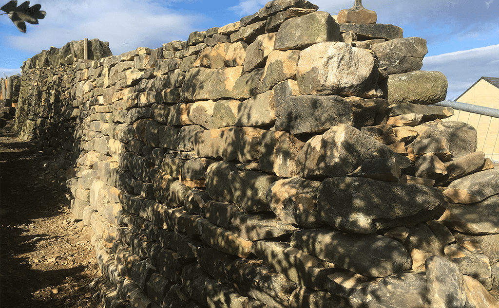 Random course dry stone field wall