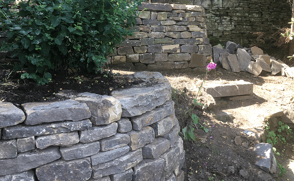 Sandstone dry stone wall terraced garden