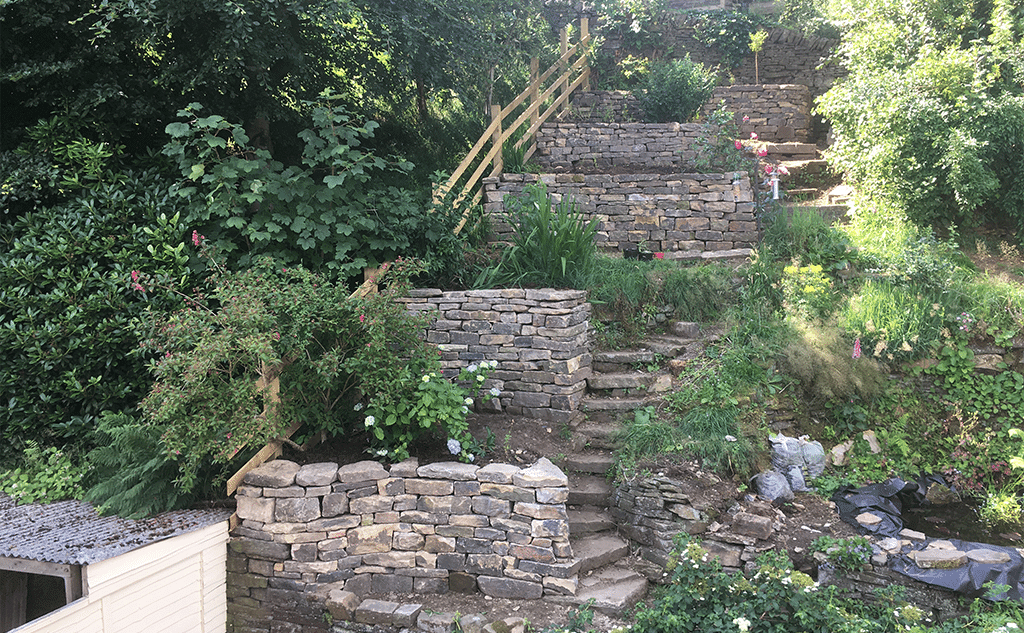 Sandstone dry stone wall terraced garden