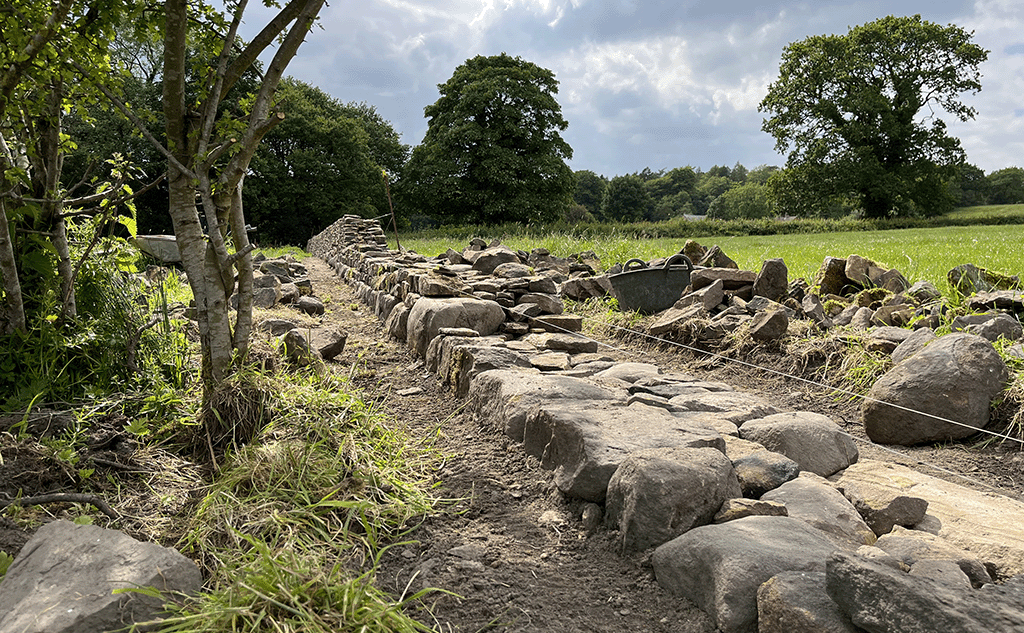 Dry stone wall foundation 